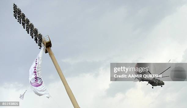 Pakistani army helicopter carrying Sri Lankan cricket team members takes off from The Gaddafi Stadium in Lahore on March 3, 2009. Pakistani air force...