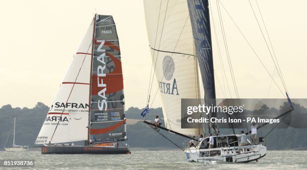 Marc Guillemot's Safran and Brian Thompson's Artemis Ocean Racing during the Artemis Challenge at Aberdeen Asset Management Cowes Week.