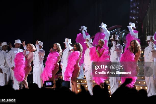 Nicola Roberts, Nadine Coyle, Cheryl Cole, Sarah Harding and Kimberley Walsh of Girls Aloud perform on stage at the 2009 Brit Awards held at Earls...