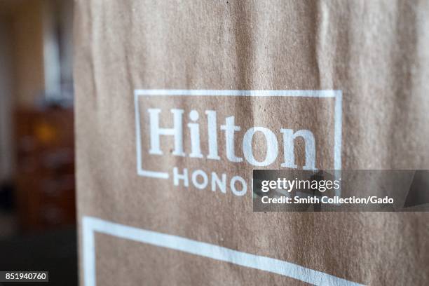 Close-up of the logo for the Hilton Honors program, part of the Hilton hotel brand, New York City, New York, September 14, 2017.