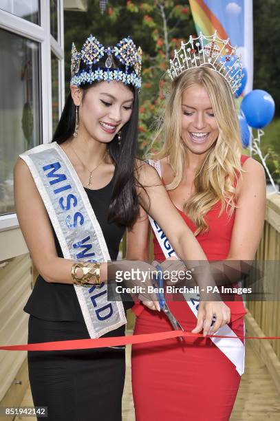 Miss World, Yu Wenxia of China and Miss England, Kirsty Heslewood cut a ribbon to officially open a new holiday home caravan at the Finlake Holiday...