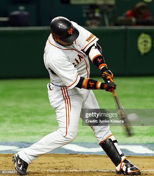 Outfielder Alex Ramirez of Yomiuri Giants hits a homer in the top half of the third inning during a friendly match between South Korea and Yomiuri...