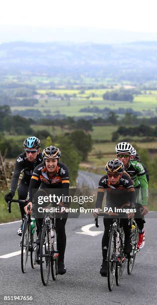 Sir Bradley Wiggins with Dani King and Laura Trott during the Ride With Brad Sportive in Lancashire.