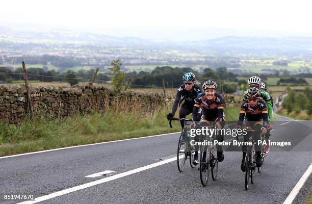 Sir Bradley Wiggins with Dani King and Laura Trott during the Ride With Brad Sportive in Lancashire.
