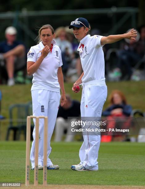 England captain Charlotte Edwards directs the field with bowler Laura Marsh during day two of the First Womens Ashes test match at Wormsley Cricket...