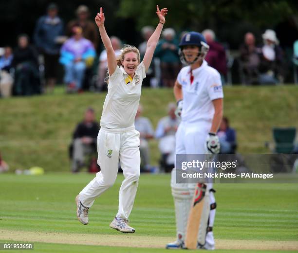 Australia bowler Holly Ferling celebrates taking the wicket of England captain Charlotte Edwards during day two of the First Womens Ashes test match...