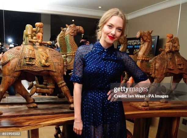 Amanda Seyfried attends a screening of new film Lovelace at the Mayfair Hotel in London.