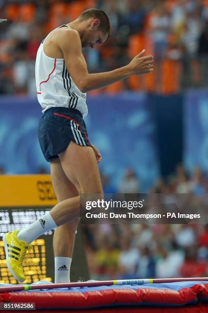 Great Britain's Robbie Grabartz reacts after failing with his third jump to be eliminated from the men's high jump final during day six of the 2013...