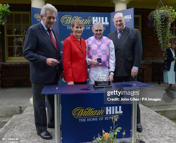Assistant trainer to Richard Fahey Mr Robin O'Ryan jockey Tony Hamilton and Mr James Henderson from William Hill following the William Hill Great St...