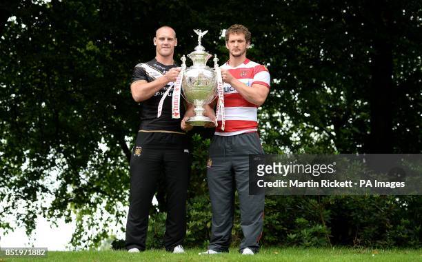 Wigan Warriors captain Sean O'Loughlin and Hull FC captain Gareth Ellis hold the Challenge Cup, during a media day at Worsley Park Marriott Hotel,...