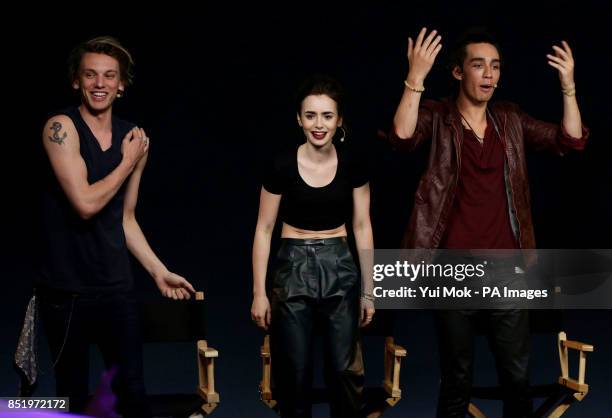 Cast members of the film The Mortal Instruments: City of Bones Jamie Campbell Bower, Lily Collins and Robert Sheehan during a Meet the Actors event,...