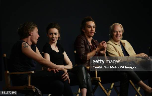 Director Harald Zwart with cast members of the film The Mortal Instruments: City of Bones Jamie Campbell Bower, Lily Collins and Robert Sheehan...