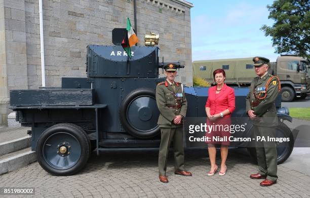 Ireland's newly appointed Chief of Defence Forces Staff Lieutenant General Conor O'Boyle, Helen Collins and Col Brian Reade beside the iconic Sliabh...