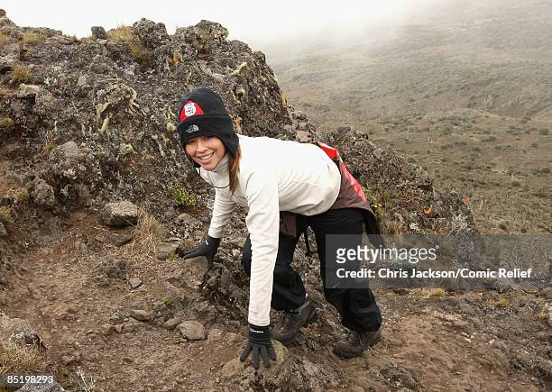 Kimberley Walsh treks up a steep section of mountain on the second day of The BT Red Nose Climb of Kilimanjaro on March 3, 2009 in Arusha, Tanzania....