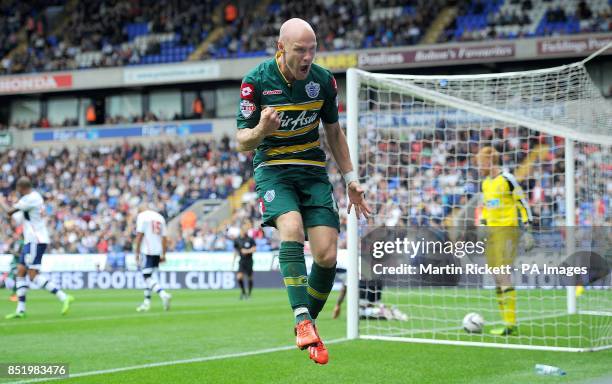 Queens Park Rangers Andrew Johnson celebrates scoring his sides opening goal during the Sky Bet Football League Championship match at the Reebok...