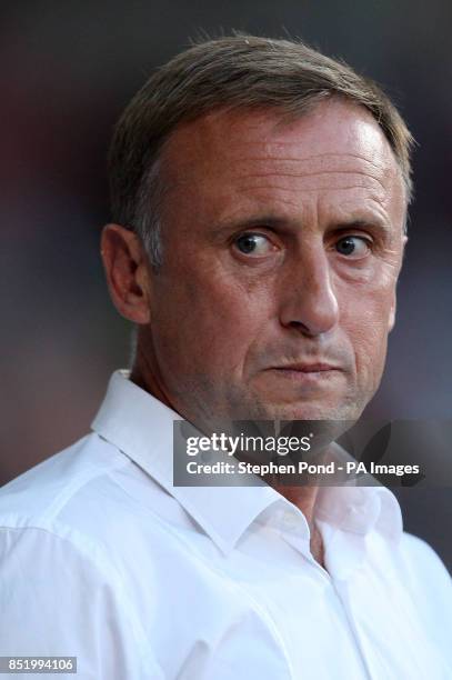 Cheltenham Town's Manager Mark Yates on the touchline during the Capital One Cup, Second Round match at Upton Park, London.