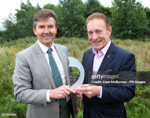 Irish singer Daniel O'Donnell with Denis Broderick from Derry, Northern Ireland, who won the Workplace Award at Ireland's Deaf and Hard of Hearing...