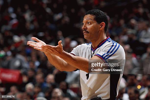 Referee Bill Kennedy gestures during the game between the Orlando Magic and the Chicago Bulls at the United Center on February 24, 2009 in Chicago,...