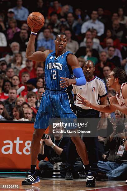 Dwight Howard of the Orlando Magic looks to pass during the game against the Chicago Bulls at the United Center on February 24, 2009 in Chicago,...