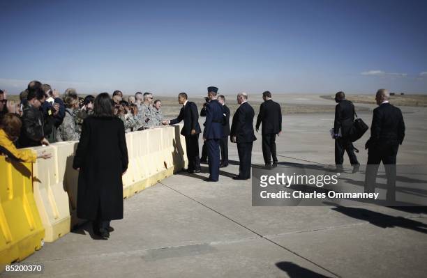 President Barack Obama greets supporters upon his arrival at Buckley Air Force Base near Denver, Colorado, February 17, 2009. President Obama headed...