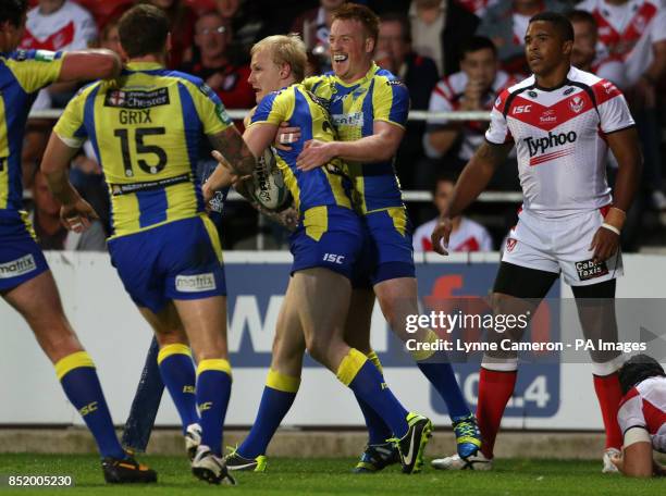 Warrington Wolves Rhys Evans celebrates a try during the Super League match at Langtree Park, St Helens.