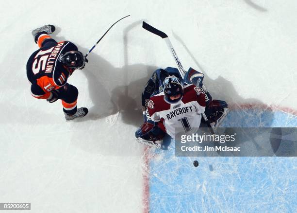 Andrew Raycroft of the Colorado Avalanche surrenders a first period goal against the New York Islanders on March 2, 2009 at Nassau Coliseum in...
