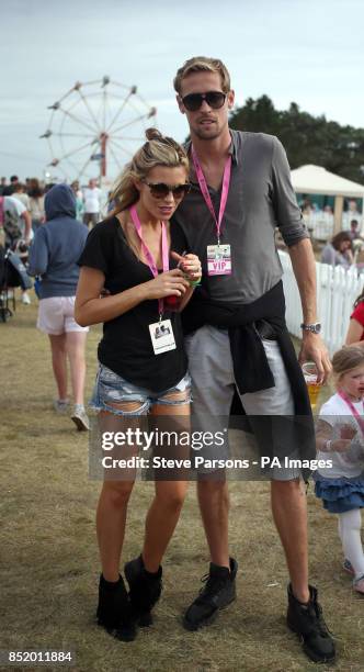 Abbey Clancy and Peter Crouch enjoy the Big Feastival, organised by Alex James and Jamie Oliver at Alex James' farm in Kingham, Oxfordshire.