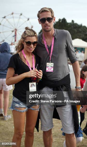 Abbey Clancy and Peter Crouch enjoy the Big Feastival, organised by Alex James and Jamie Oliver at Alex James' farm in Kingham, Oxfordshire.