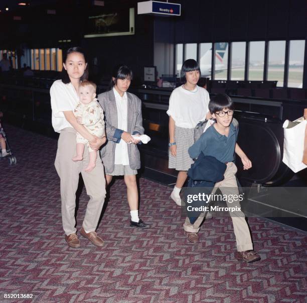 Some of the children of Woody Allen and his partner, actress Mia Farrow, travelling with them at London Heathrow Airport, 8th August 1988, .