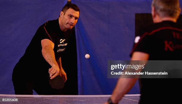 Vitali Klitschko of Ukraine plays table tennis with his coach Fritz Sdunek during a training session on March 3, 2009 in Going, Austria. The WBC...