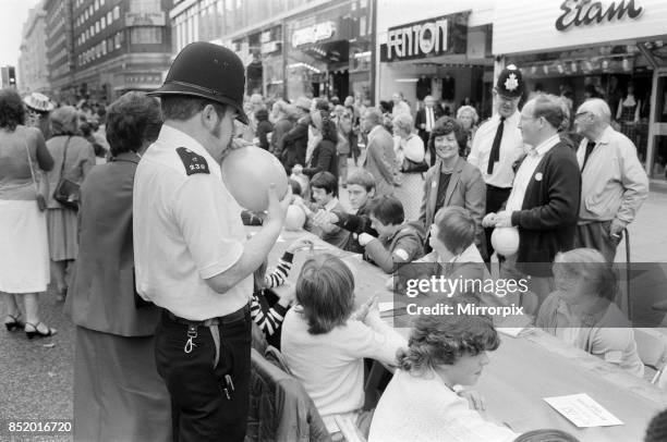 The Oxford Street Association staged a party for over 5000 children ahead of the Royal Wedding, police assisted with the blowing up of balloons and...
