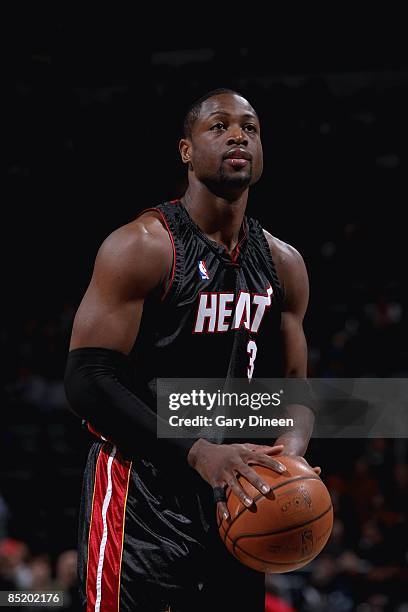 Dwyane Wade of the Miami Heat shoots a free throw during the game against the Milwaukee Bucks on January 14, 2009 at the Bradley Center in Milwaukee,...