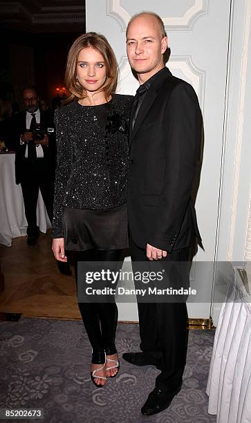 Natalia Vodianova and friend attends the Fortune Forum Summit at the Dorchester Hotel on March 3, 2009 in London, England.