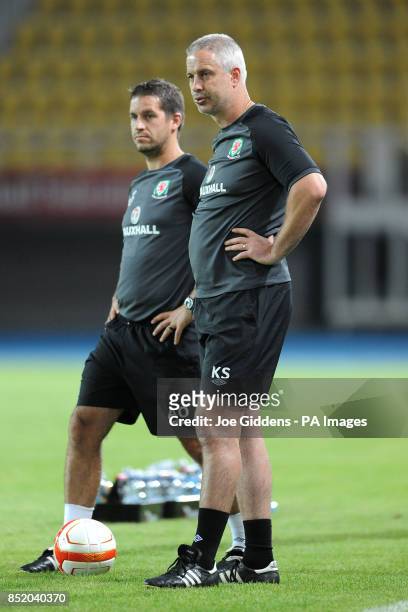 Wales' assistant manager Kit Symons watches over training in the absence of manager Chris Coleman at the Phillip II Arena, Skopje, Macedonia.