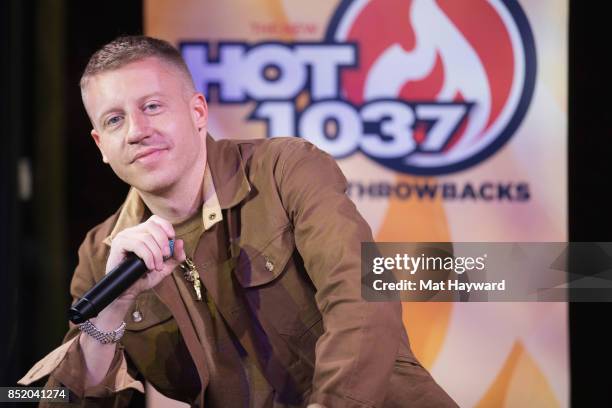 Ben Haggerty aka Macklemore gives an interview at Hot 103.7 as his new solo album "Gemini" is released on September 22, 2017 in Seattle, Washington.