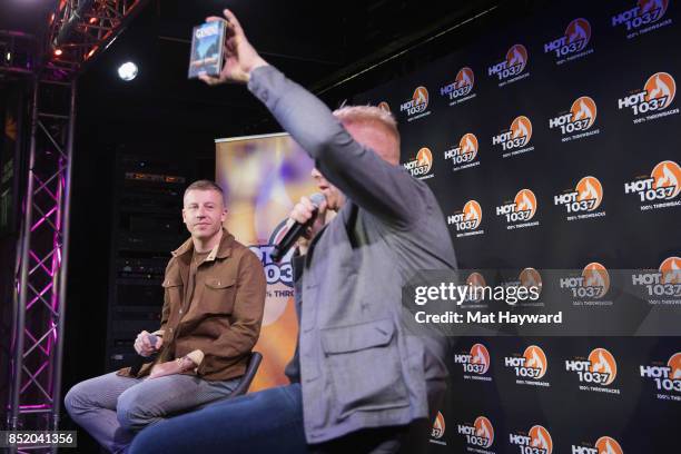 Ben Haggerty aka Macklemore gives an interview to on air personality Eric Powers at Hot 103.7 as his new solo album "Gemini" is released on September...