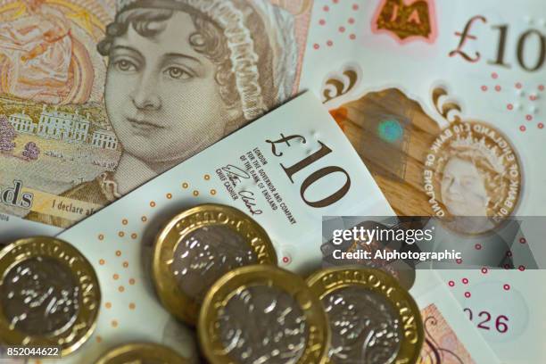 new pound coin released 2017 - balance finance minimal stock pictures, royalty-free photos & images