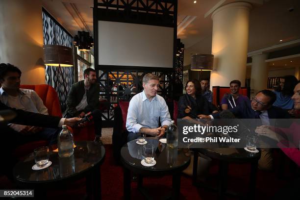 Prime Minister Bill English speaks to the media alongside his wife Mary English at the Pullman Hotel on September 23, 2017 in Auckland, New Zealand....