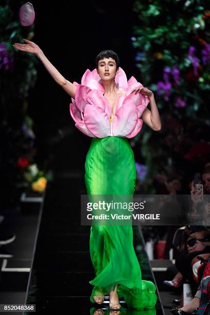 Anna Cleveland walks the runway at the Moschino Ready to Wear Spring/Summer 2018 fashion show during Milan Fashion Week Spring/Summer 2018 on...
