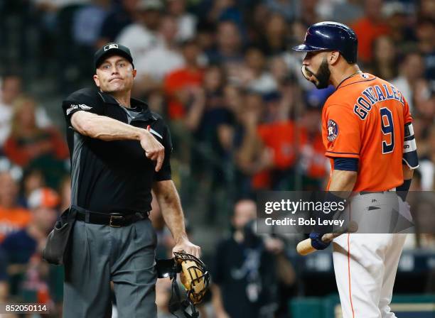 Home plate umpire Dan Iassogna ejects Marwin Gonzalez of the Houston Astros in the seventh inning for arguing balls and strikes against the Los...