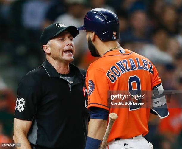 Home plate umpire Dan Iassogna ejects Marwin Gonzalez of the Houston Astros in the seventh inning for arguing balls and strikes against the Los...