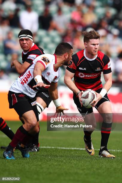 Mitchell Drummond of Canterbury looks to pass the ball out during the round six Mitre 10 Cup match between North Harbour and Canterbury at QBE...