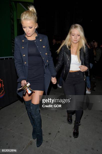 Lottie Moss and Olivia Bentley leaving Embargo nightclub in Chelsea on September 22, 2017 in London, England.