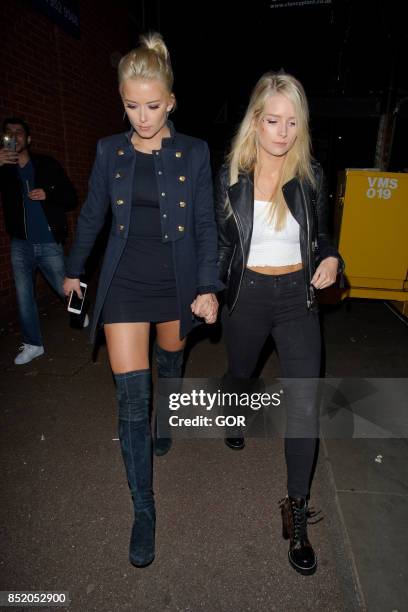 Lottie Moss and Olivia Bentley leaving Embargo nightclub in Chelsea on September 22, 2017 in London, England.