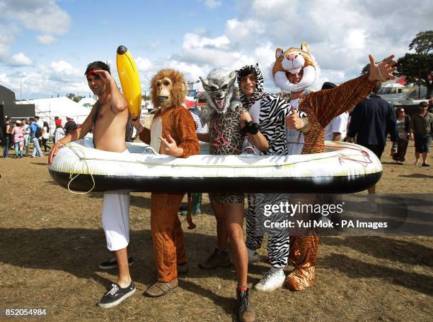 Festival goers in fancy dress at Bestival, held at Robin Hill Country Park on the Isle of Wight.