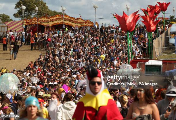 Festival goers with many in fancy dress, at Bestival, held at Robin Hill Country Park on the Isle of Wight.