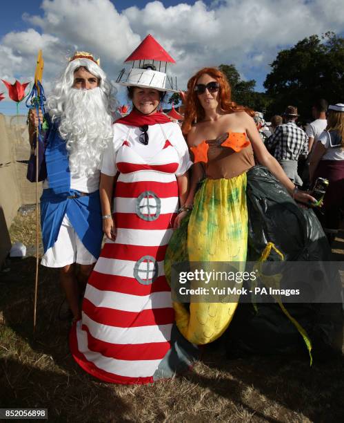 Festival goers in fancy dress at Bestival, held at Robin Hill Country Park on the Isle of Wight.