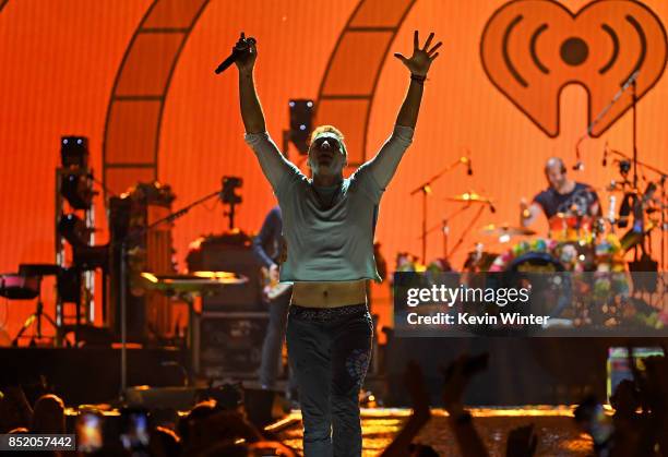 Chris Martin of music group Coldplay performs onstage during the 2017 iHeartRadio Music Festival at T-Mobile Arena on September 22, 2017 in Las...