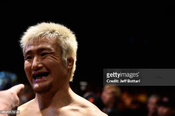 Takanori Gomi of Japan prepares to enter the Octagon before facing Dong Hyun Kim of South Korea in their lightweight bout during the UFC Fight Night...