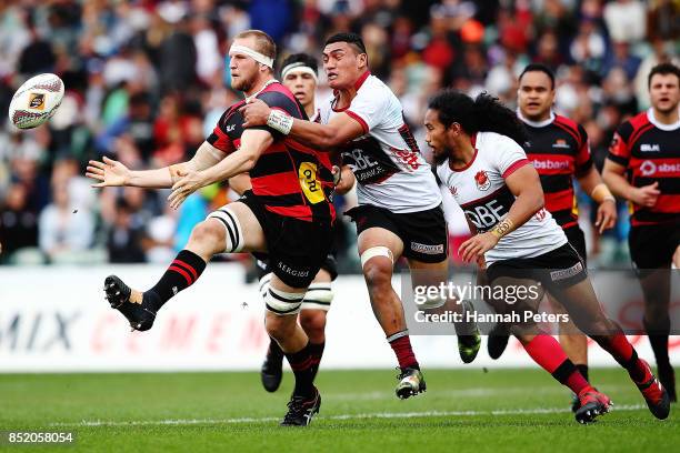 Mitchell Dunshea of Canterbury passes the ball out during the round six Mitre 10 Cup match between North Harbour and Canterbury at QBE Stadium on...